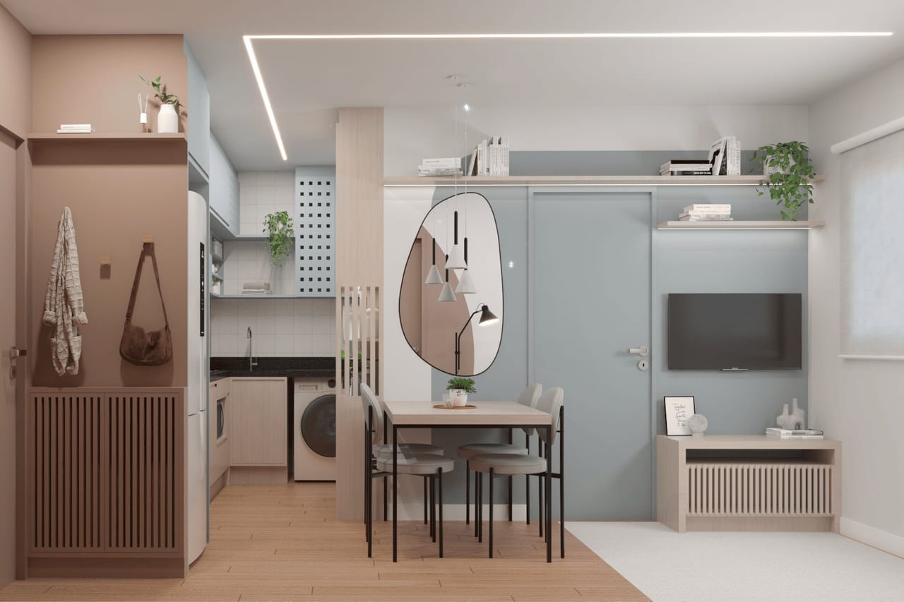 Ambiente integrado do Apartamento Rosé Funcional com cozinha, bancada e área de estudo